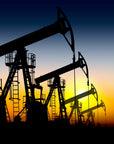Petroleum drills at sunset [Image credit: feelgrafix.com]