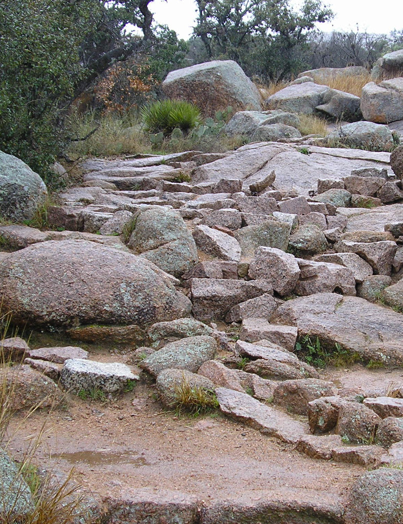 Pink granite boulders line a hill